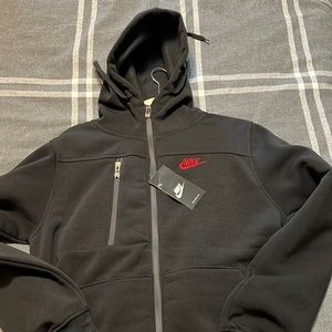Black with red logo Nike track tech track suit